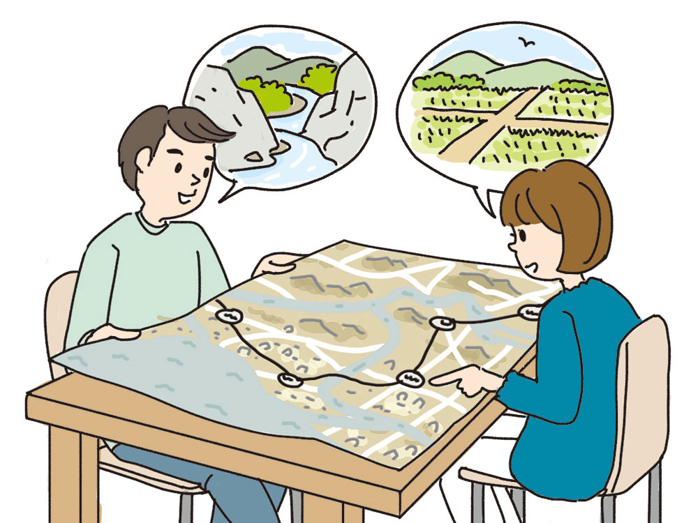 古い地図を見る夫婦