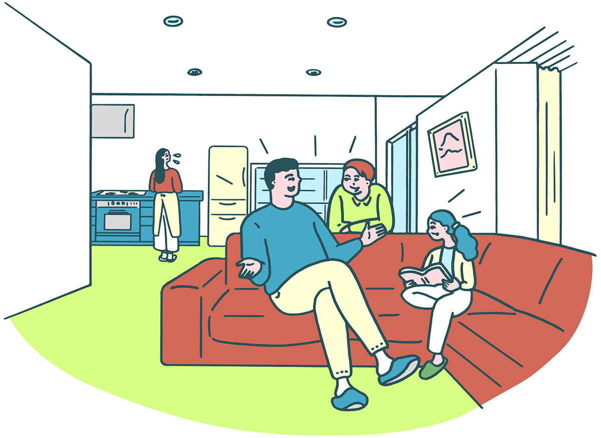 壁付けキッチンで寂しそうに作業をしている人